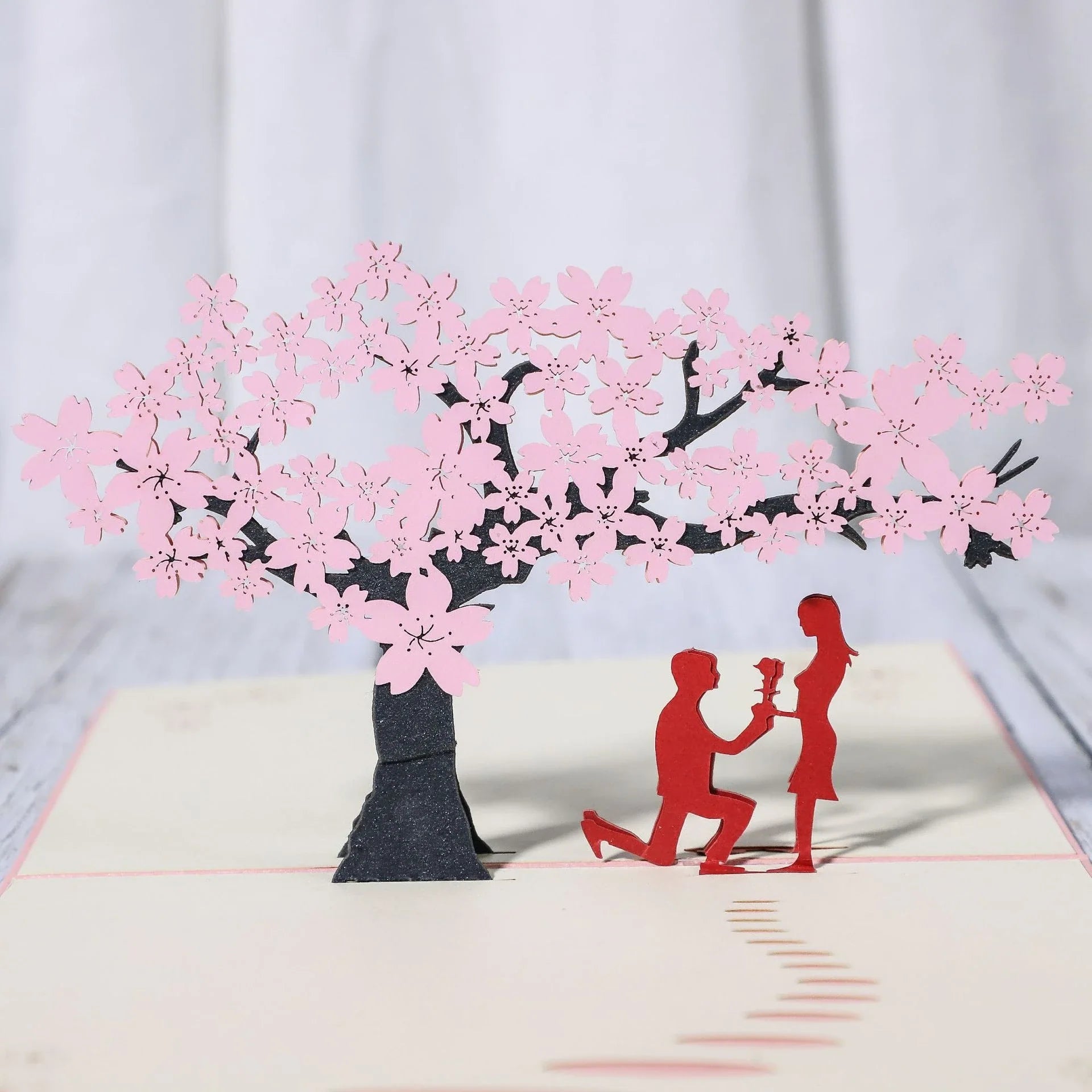 Elegant 3D pop-up wedding and anniversary greeting cards with laser-cut designs in a variety of romantic themes