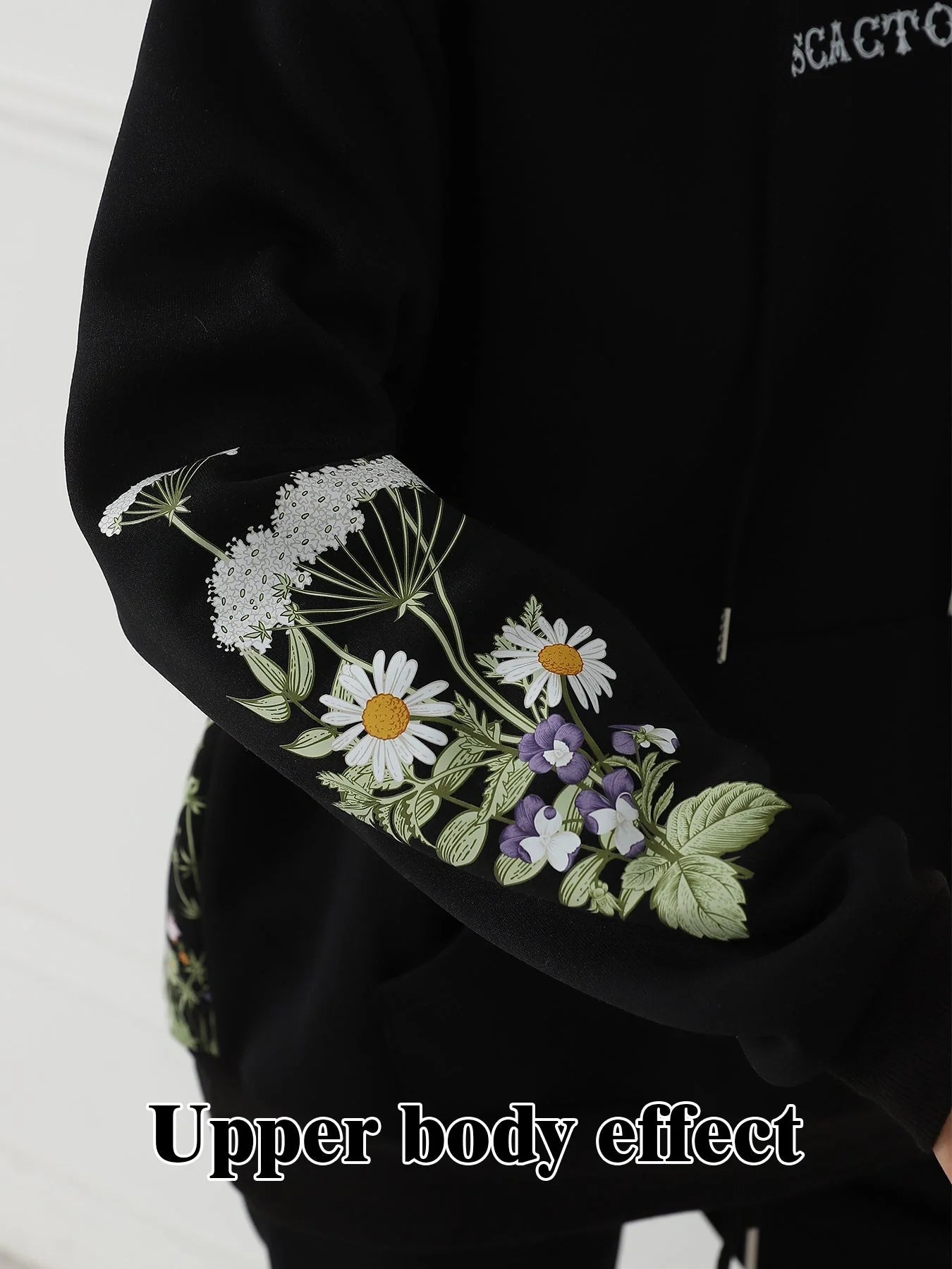 Women's floral long sleeved sweatshirt in black, blue, and apricot