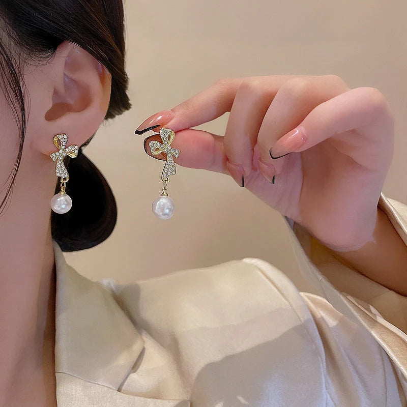 Gold bow diamond crystal earrings for women, fashionable and elegant