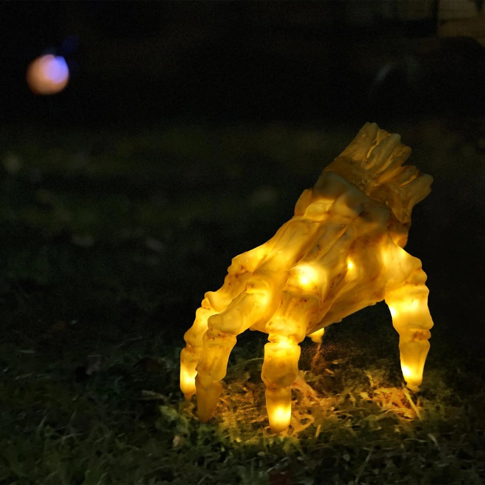 Realistic glowing zombie hand Halloween decoration with spooky sound and movement