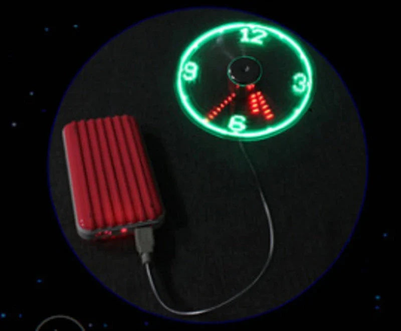 Adjustable USB desktop fan with LED light and digital clock, providing customizable airflow and workspace convenience