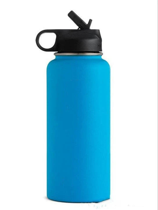 Premium stainless steel insulated tumbler with push-button lid and sleek design for outdoor adventures and active lifestyles.
