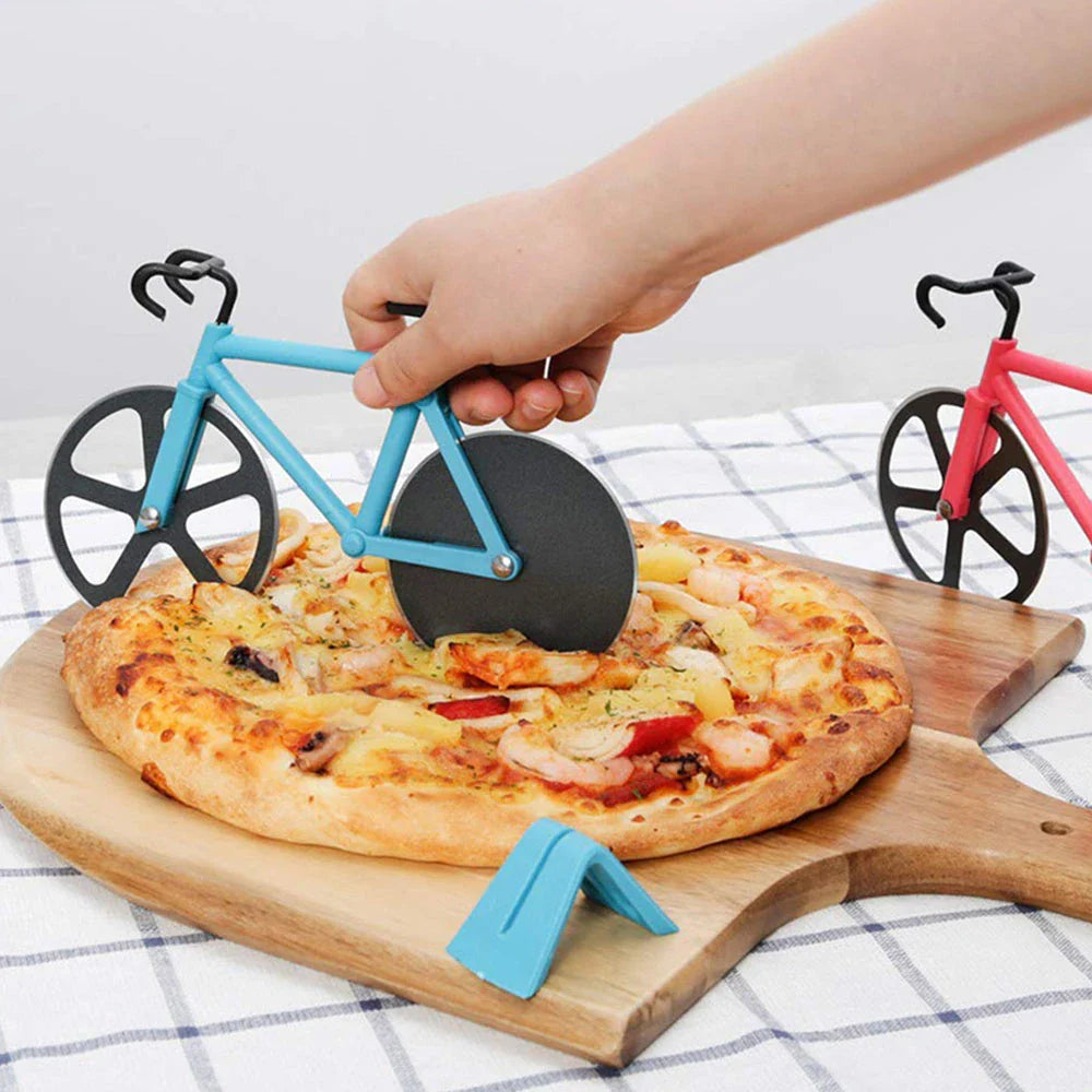 Stainless steel pizza cutter with modern bicycle-inspired design for effortless slicing of pizzas, flatbreads, and more