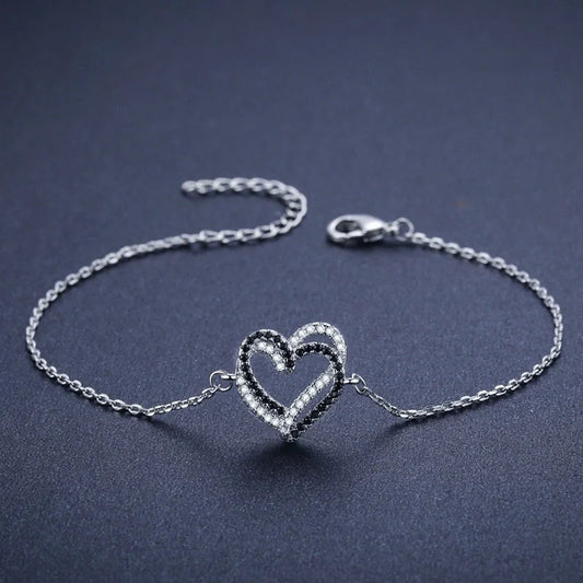 Elegant Titanium Steel Heart Bracelet for women, featuring a delicate heart design.