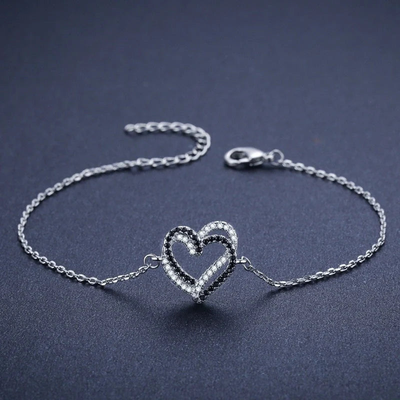 Elegant Titanium Steel Heart Bracelet for women, featuring a delicate heart design.