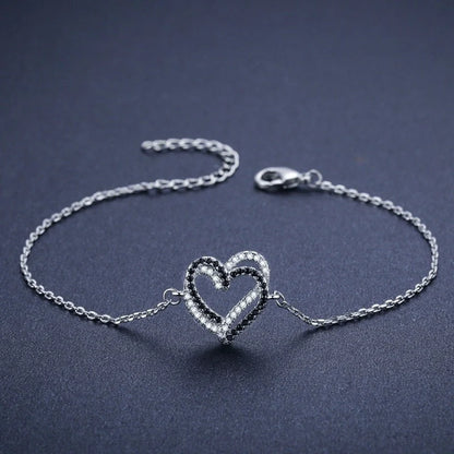 Elegant Titanium Steel Heart Bracelet for women, featuring a delicate heart design.