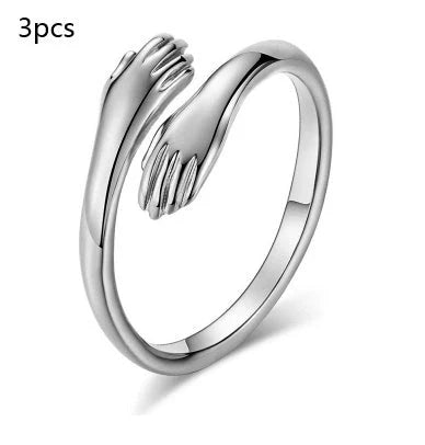Adjustable Alloy Hands Hug Ring in silver and gold, stylish unisex jewelry