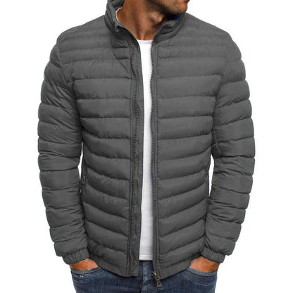 Premium men's insulated jacket in a variety of vibrant colors, featuring a durable, water-resistant outer shell and cozy polyester fiber insulation for warmth and comfort during outdoor activities.