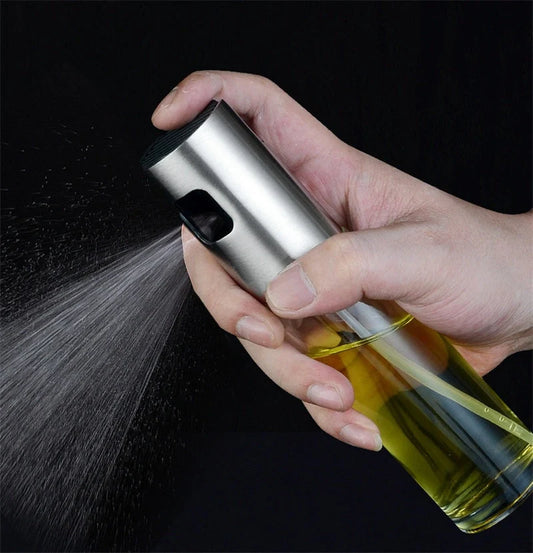 Stainless steel kitchen oil spray bottle with ergonomic button and glass body
