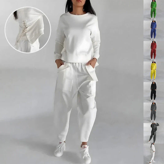 Stylish polyester sweatshirt with back slit, pockets, and available in various colors