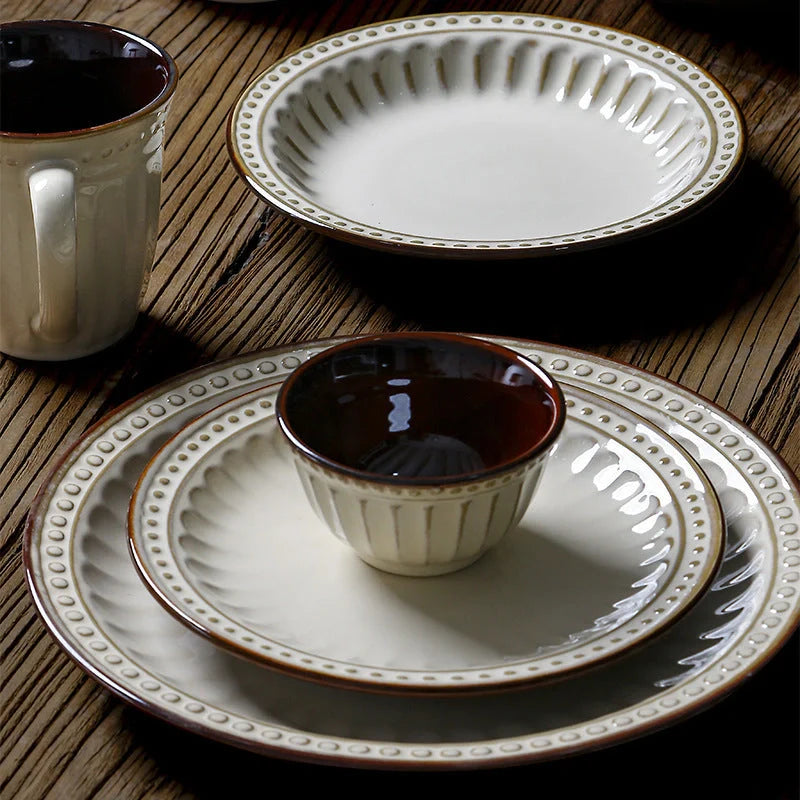 A set of 6 exquisite white ceramic plates, perfect for serving a variety of dishes in style