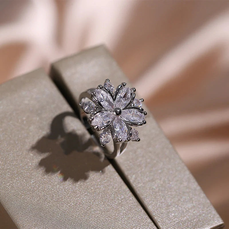 Exquisite zircon jewellery set with double-layered flower design and shimmering cubic zirconia stones