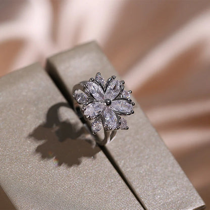 Exquisite zircon jewellery set with double-layered flower design and shimmering cubic zirconia stones