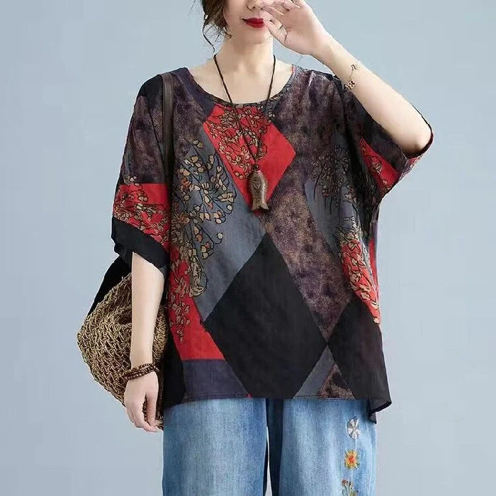 Stylish loose fit women's t-shirt in retro print with vibrant colours of yellow, red, and brown