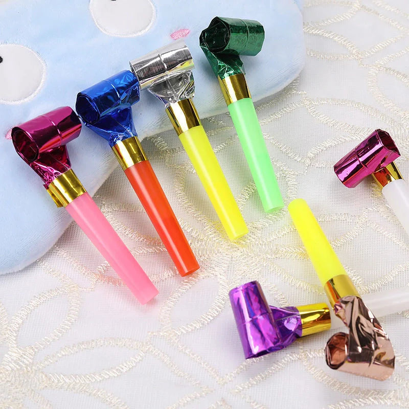 Colourful dragon-themed party favours made of high-quality plastic, including sticks and hammers in a variety of vibrant hues