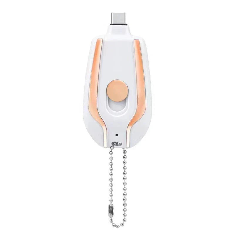 A compact, 1500mAh portable power bank with a keychain design, featuring a waterproof and durable construction for on-the-go charging of smartphones, tablets, and other USB-powered devices.