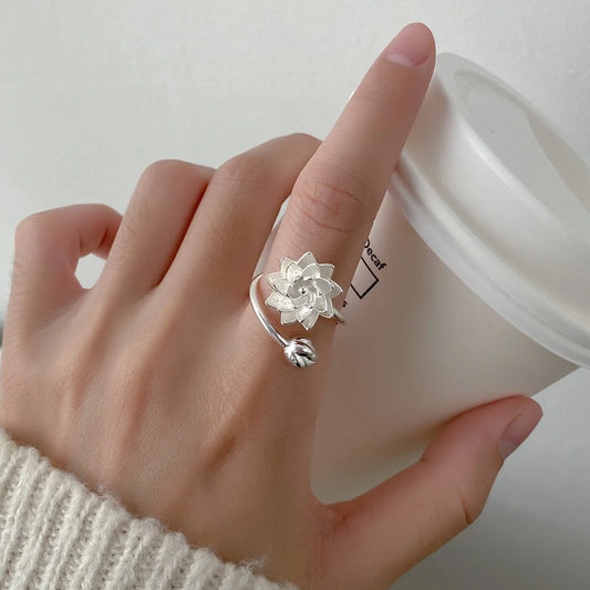 Elegant silver lotus flower adjustable opening ring with intricate design, perfect for everyday wear or special occasions
