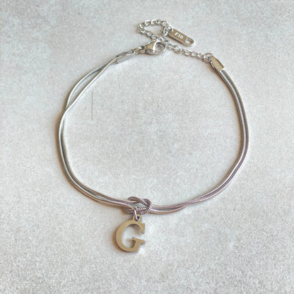 Personalised gold and silver love knot bracelets for couples, perfect as Valentine's Day gifts.