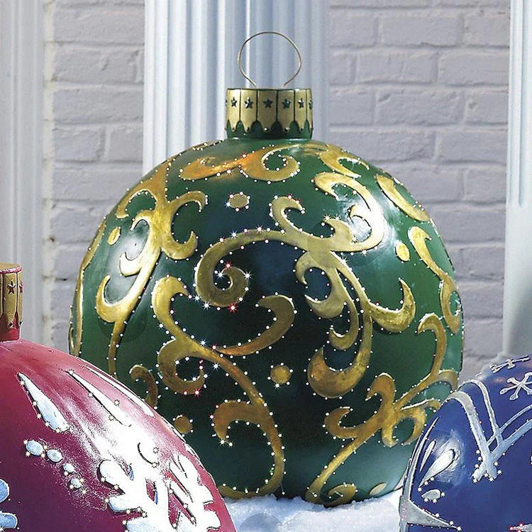 Inflatable Christmas baubles in various festive designs for outdoor holiday decoration