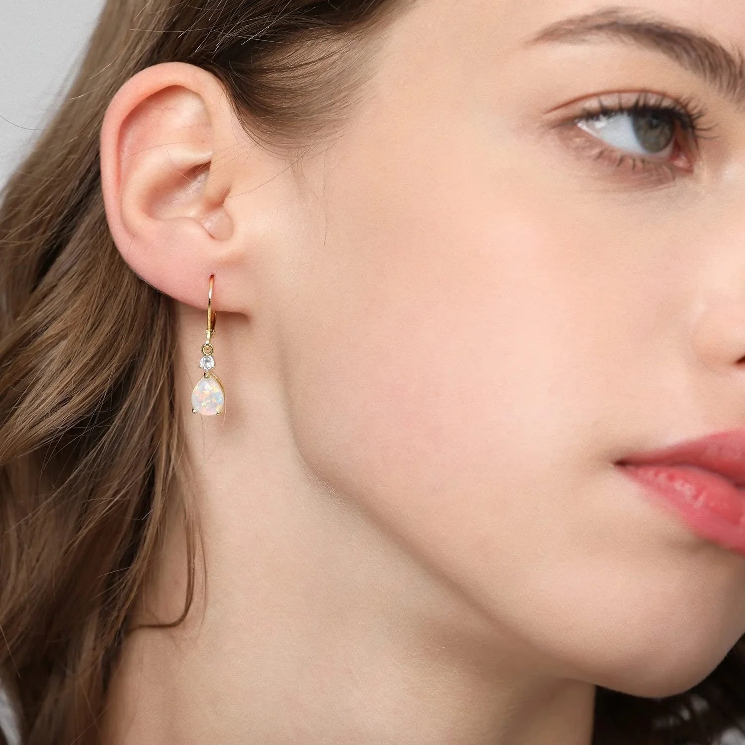 Elegant White Opal Drop Earrings for women with Australian opals in a geometric water droplet design