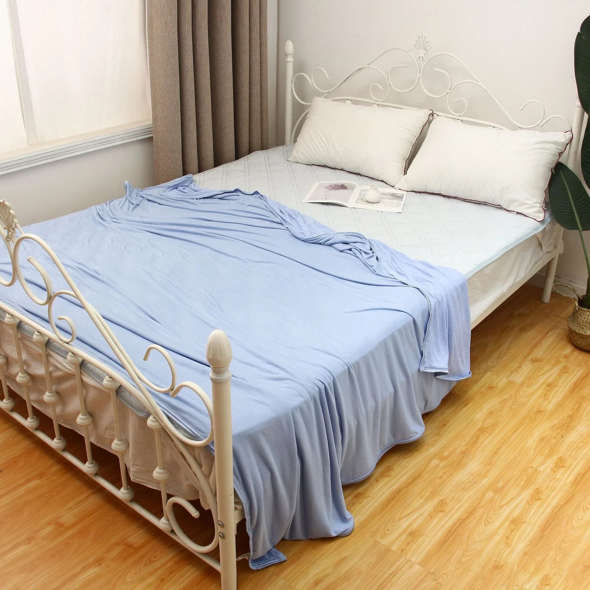 A premium polyester cooling blanket with innovative Japanese cooling fibers that provides refreshing temperature regulation for a comfortable sleep experience