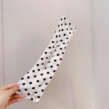 Women's elegant cloth headband with diamond and pearl accents for stylish hairstyles