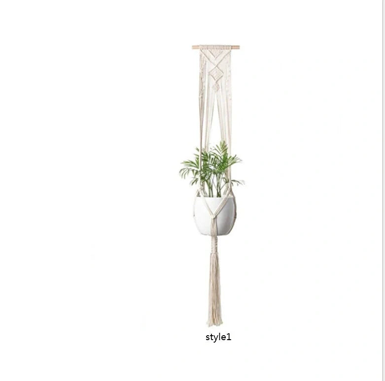 Handmade bohemian macrame hanging plant baskets in a set of four, perfect for home decor.