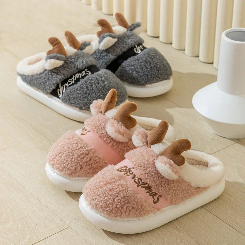 Cozy elk-themed slippers in a variety of festive colors, featuring a plush suede upper and supportive EVA sole for maximum comfort and warmth.