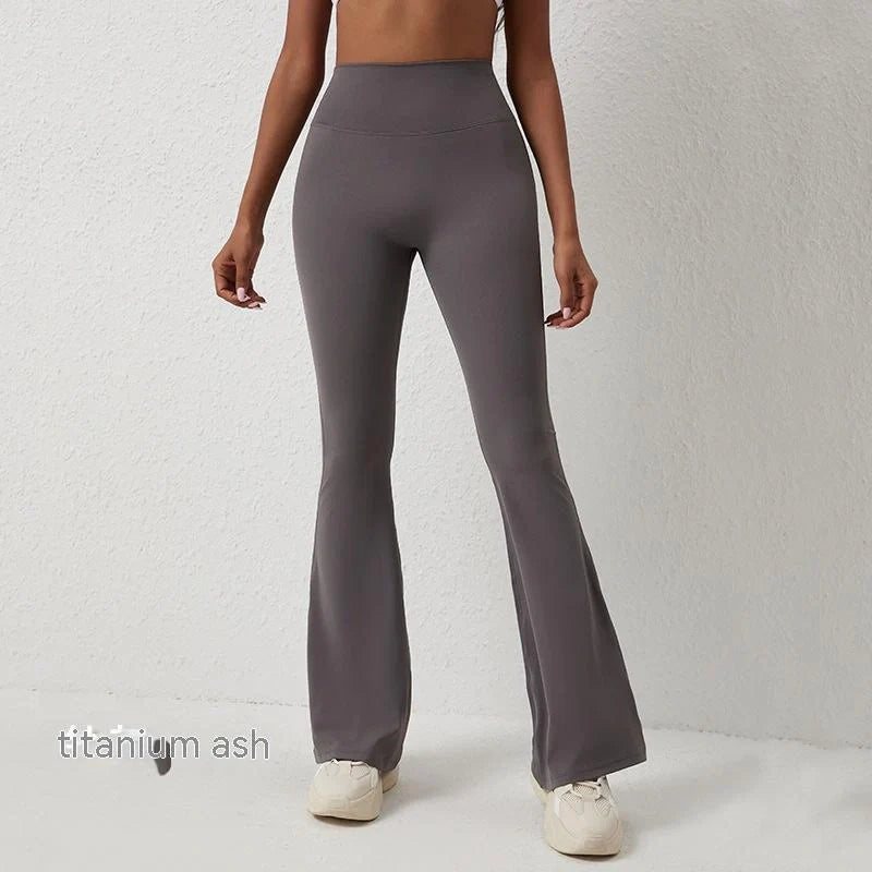 Premium high-rise slimming trousers with wide leg, crafted from Naked Sensation fabric for superior comfort and a flattering fit