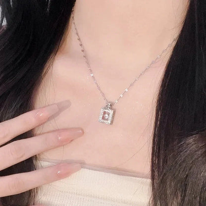 Valentine's Day titanium steel perfume bottle pendant necklace with zircon detail