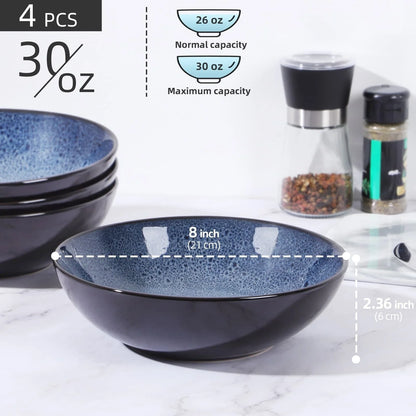 Set of four peacock green ceramic bowls with kiln change finish, 30oz capacity