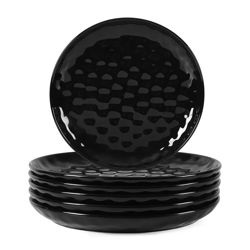 Elegant black ceramic dinner plate set with hammered design, perfect for parties and family dinners