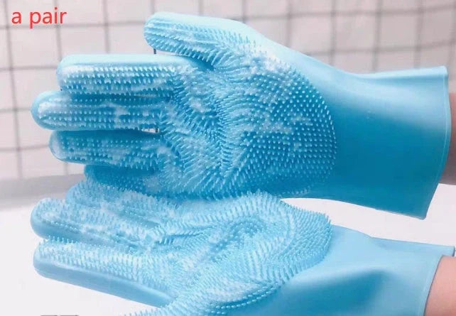 Silicone pet grooming glove in green and blue for small dogs and cats