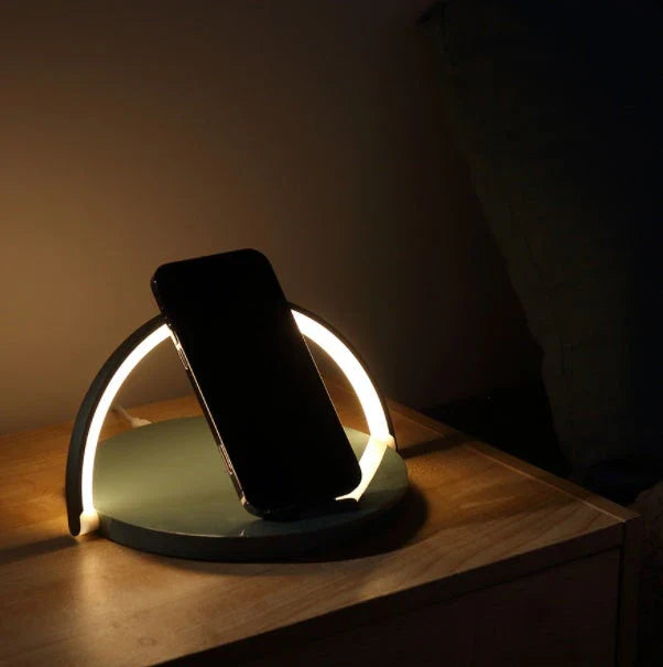 Foldable wireless charging stand with integrated LED table lamp for smartphones