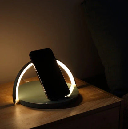 Foldable wireless charging stand with integrated LED table lamp for smartphones
