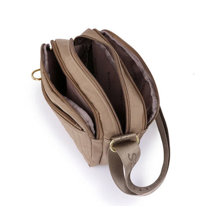 Women's lightweight nylon cross body messenger bag in various colours