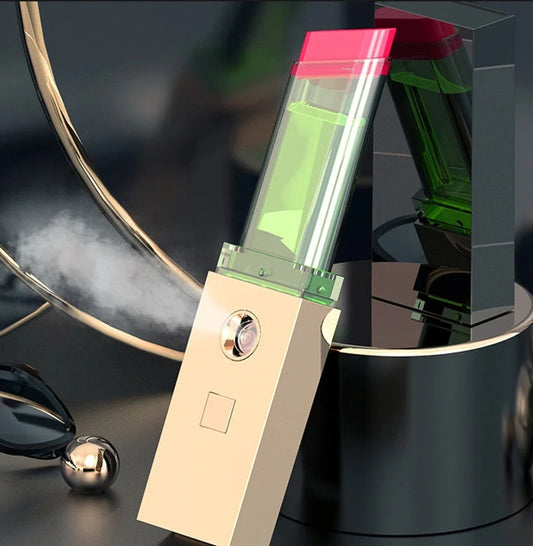 Nano Spray Water Replenishing Instrument in golden color with USB charging