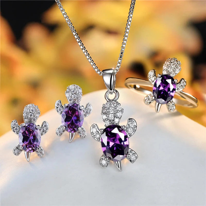 Stylish turtle pendant necklace with vibrant rainbow stones, perfect for women and children.