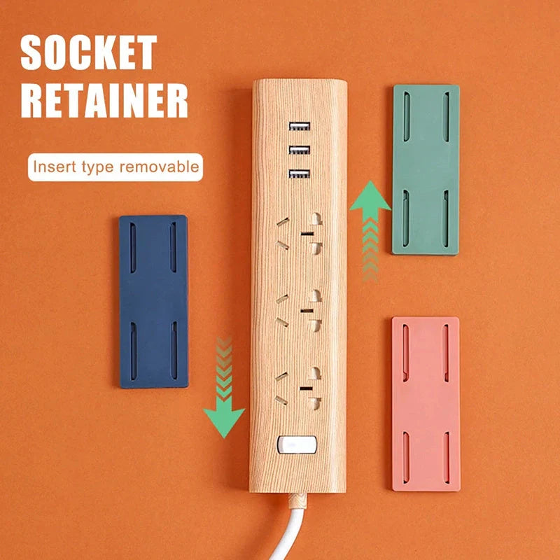 Self-adhesive wall hook in green, blue, white, and pink for cable organisation