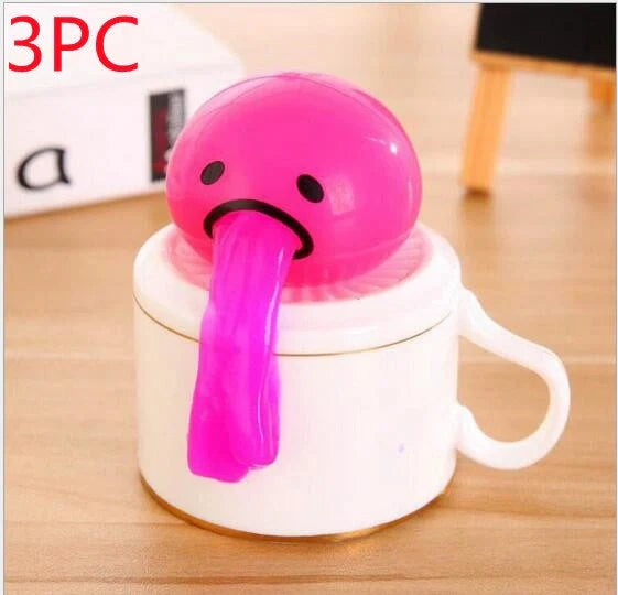 Gudetama Vomiting Egg Toy in green, orange, pink, and yellow