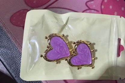 Elegant stainless steel heart-shaped earrings in a range of captivating colours, perfect for adding a touch of romantic flair to any outfit.