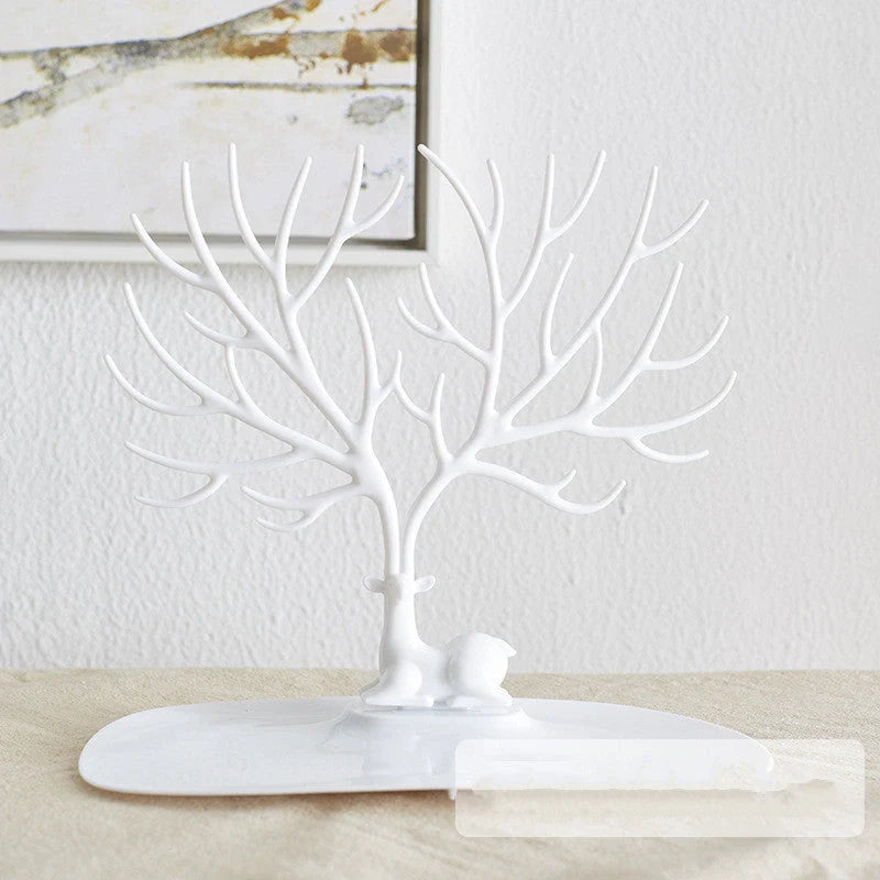 Deer Antler Jewelry Stand in white and black, displaying necklaces and earrings