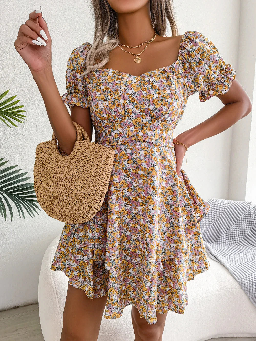 Stylish floral mini dress with A-line silhouette, high waist, and ruffled hem in various vibrant colors