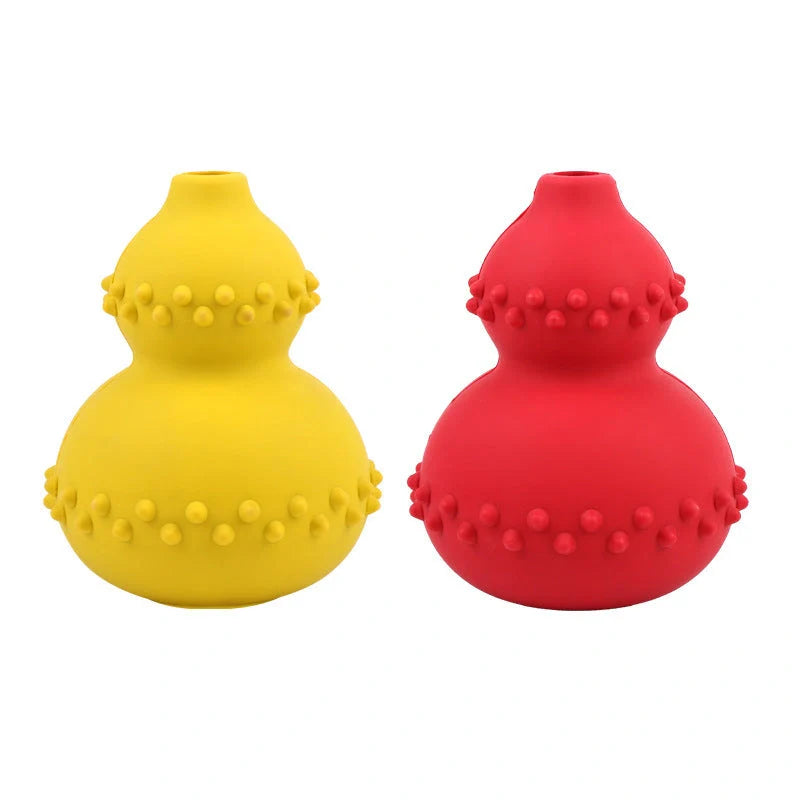 A durable, interactive dog toy made of natural rubber that dispenses treats as the dog plays with it