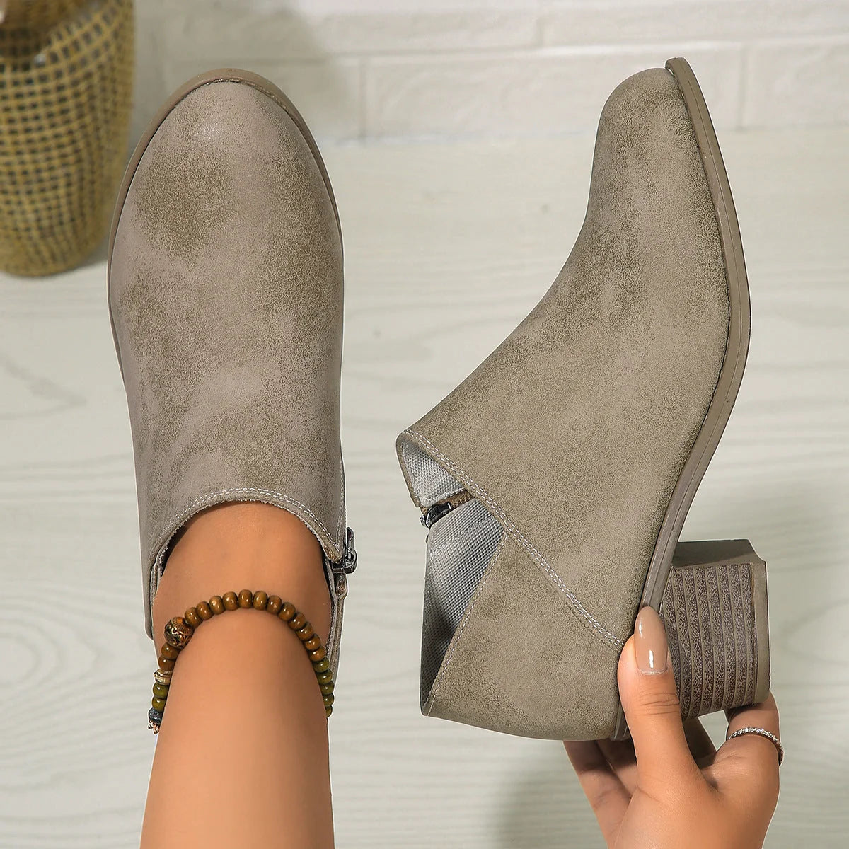 Women's chunky heel ankle boots with side zipper in navy blue, black, and khaki
