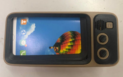 Vintage-inspired portable Bluetooth speaker with retro TV-style design and sleek, compact body