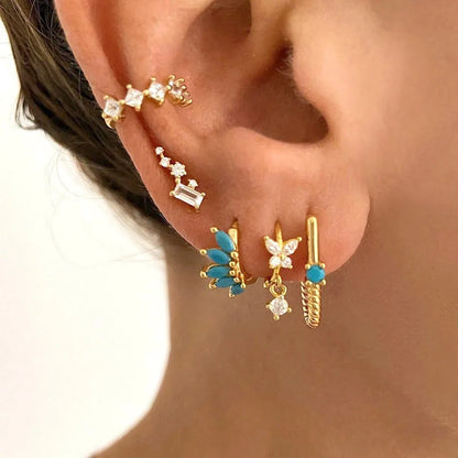 Elegant British-inspired Horse Eye Stone Earrings with a mesmerising symmetrical design and premium precious stones