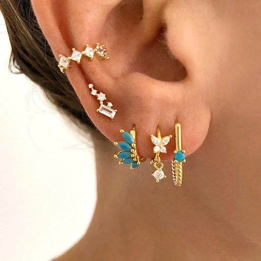 Elegant British-inspired Horse Eye Stone Earrings with a mesmerising symmetrical design and premium precious stones