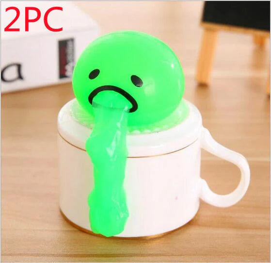 Gudetama Vomiting Egg Toy in green, orange, pink, and yellow