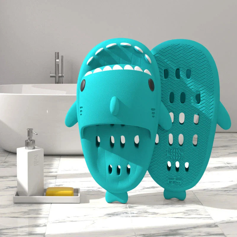 Fashionable shark-themed shower slides with drainage holes, featuring a realistic shark design, quick-drying EVA material, and non-slip traction.